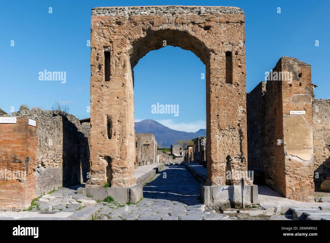 Pompeii Archaeological Site, Campania, Italy.  Arch of Caligula is the current name.  It has been variously known as the Arch of Tiberius, the Arch of Stock Photo
