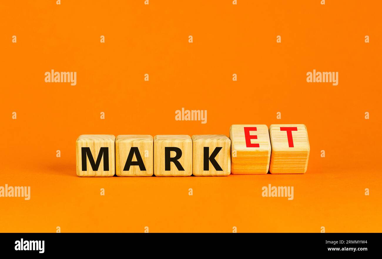 Marget Mark Mark of market symbol. Businessman turns wooden cubes and changes word ...