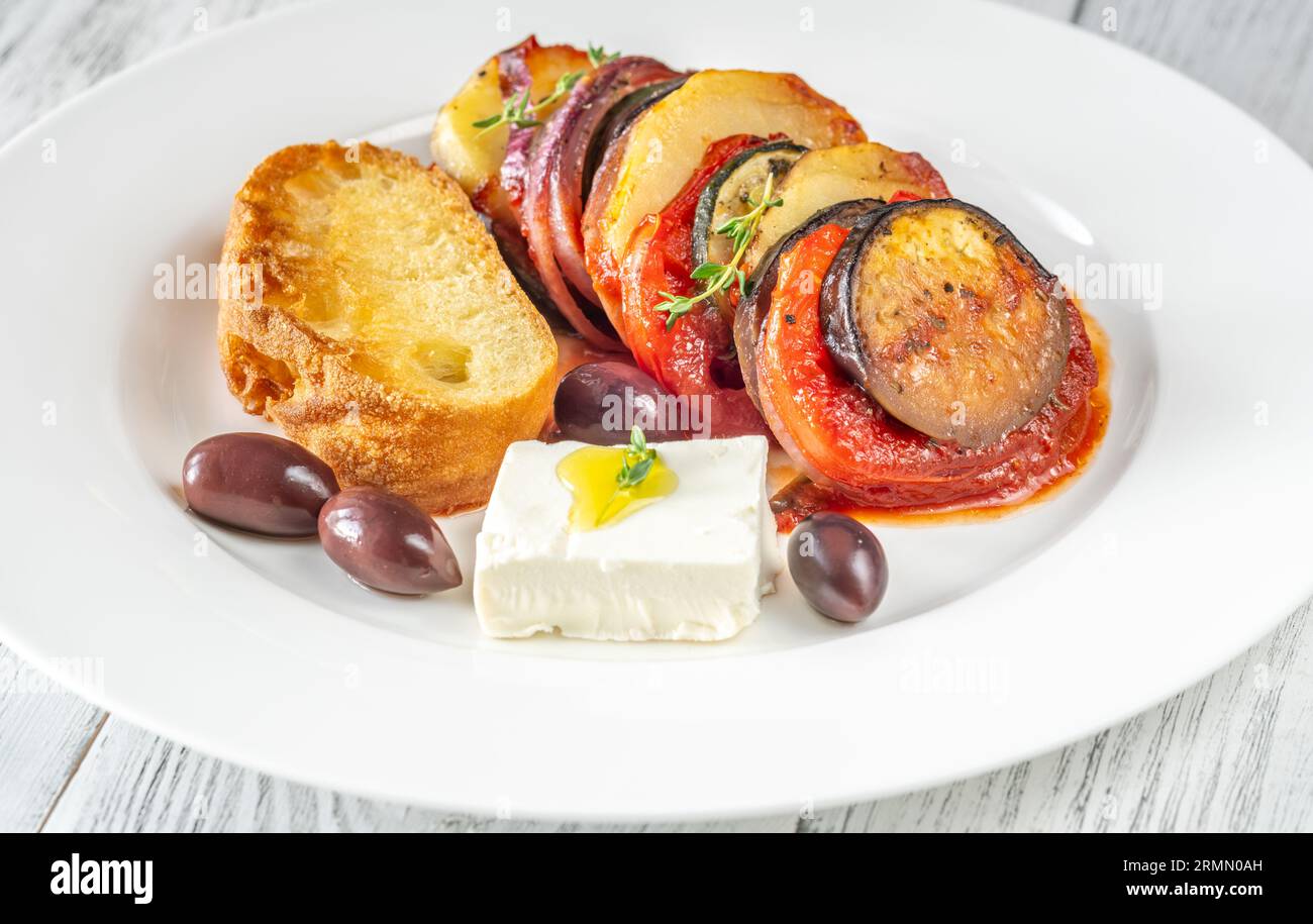 Portion of Briam Greek Vegetable Bake with feta Stock Photo Alamy