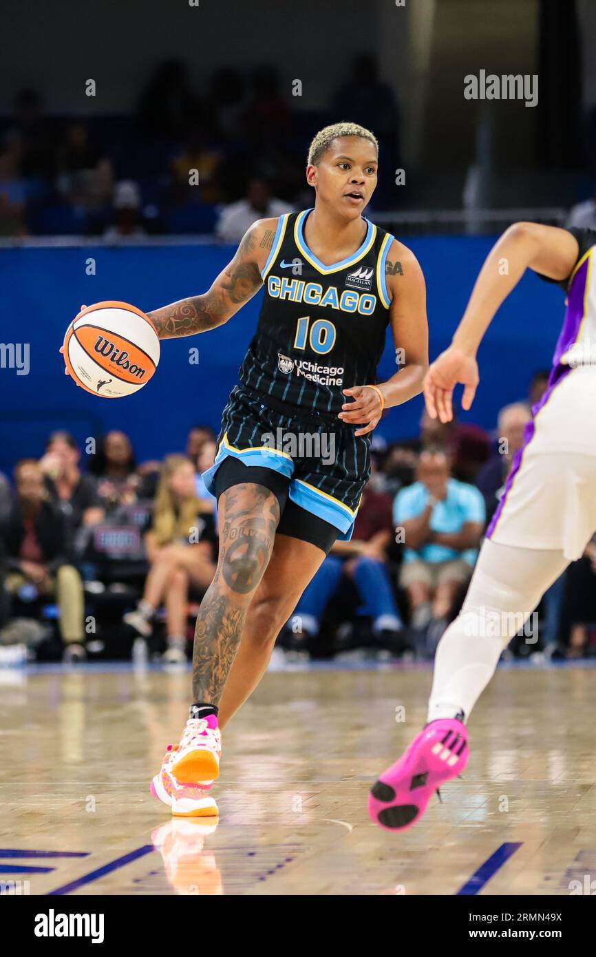 Courtney Williams of the Chicago Sky dribbling near a defender in Chicago, IL at Wintrust Arena. Stock Photo