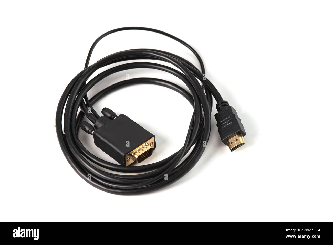 HDMI to VGA and audio adapter on white background. Allows users to connect devices with various types of displays such as computers to projectors or o Stock Photo