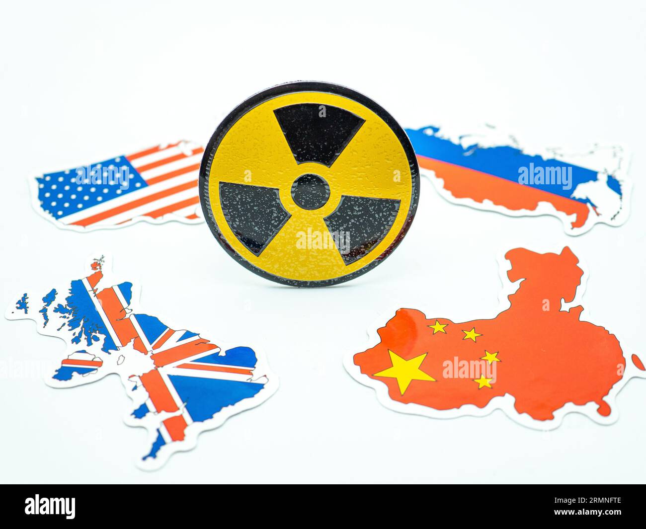 nuke radioactive sign and country maps of us, russia, uk, china Stock Photo