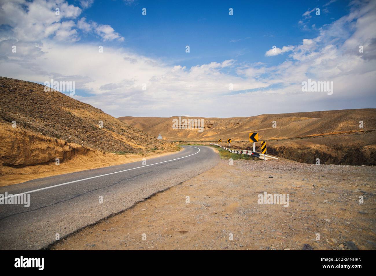Road through the famous tourist places of central asia in the steppe of Almaty region in Kazakhstan Stock Photo