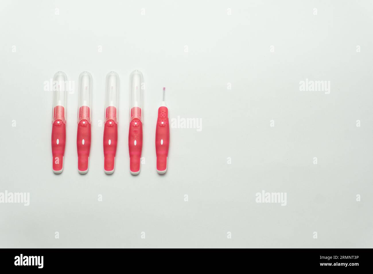 Interdental brush sticks isolated on white background, dental floss