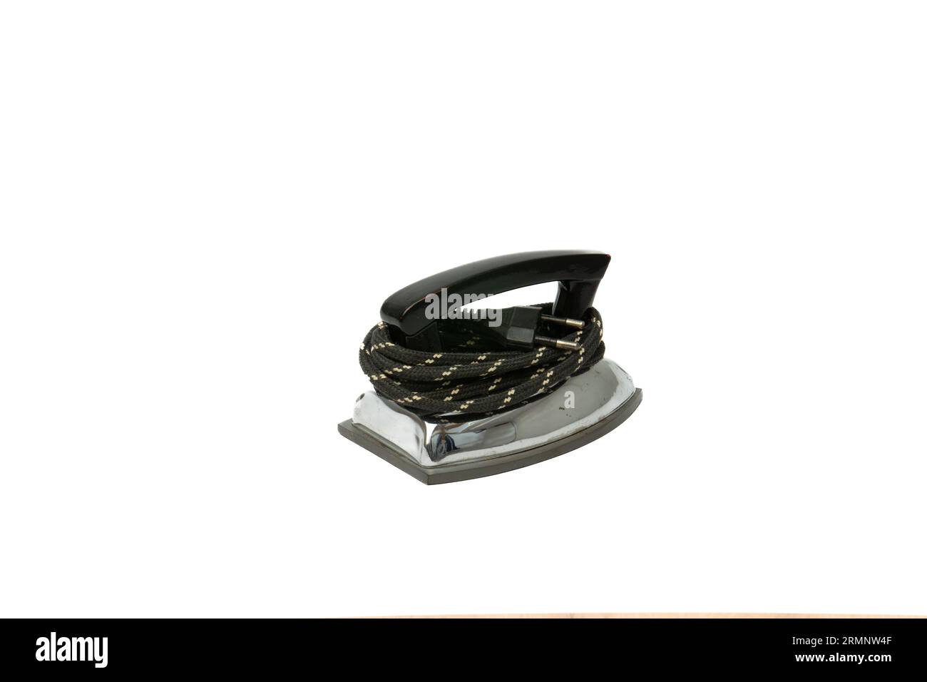 small old electric iron isolated on white background. Vintage small