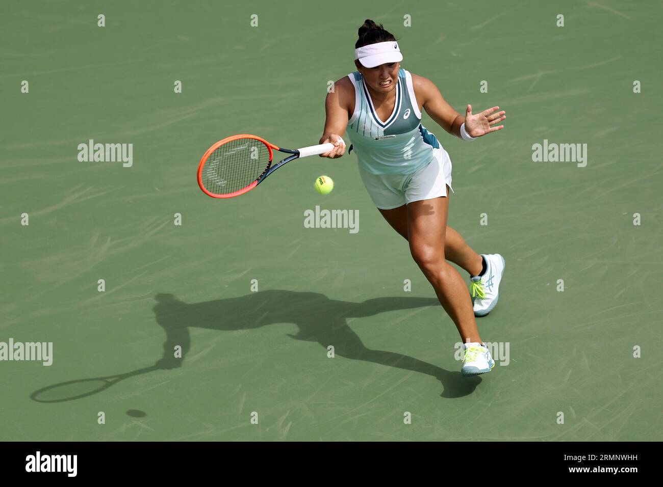 Claire Liu in action during a women's singles match at
