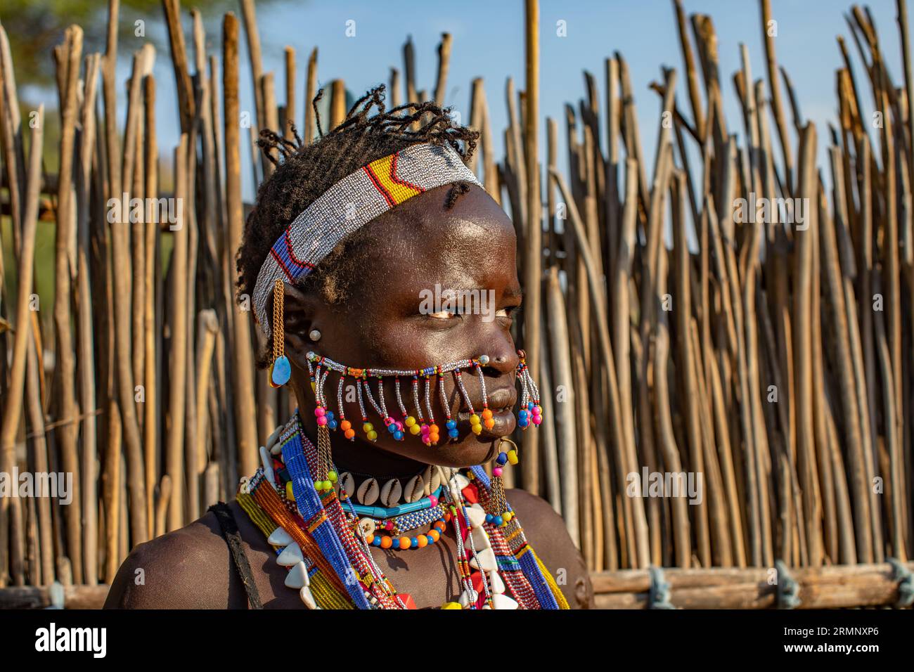 Woman from Larim tribe with decorations on her face Stock Photo