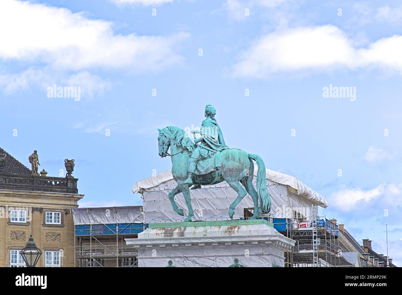 Bronze Equestrian Statue Monument of King Frederik V on the Amalienborg Palace Square in the capital of Copenhagen, Denmark Stock Photo