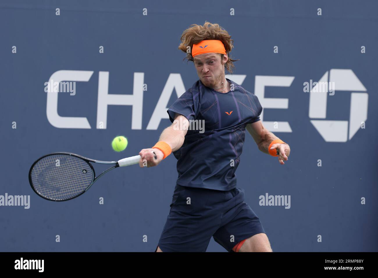 Andrey Rublev, of Russia, returns a shot to Arthur Cazaux, of France,  during the first round of the U.S. Open tennis championships, Tuesday, Aug.  29, 2023, in New York. (AP Photo/Jason DeCrow