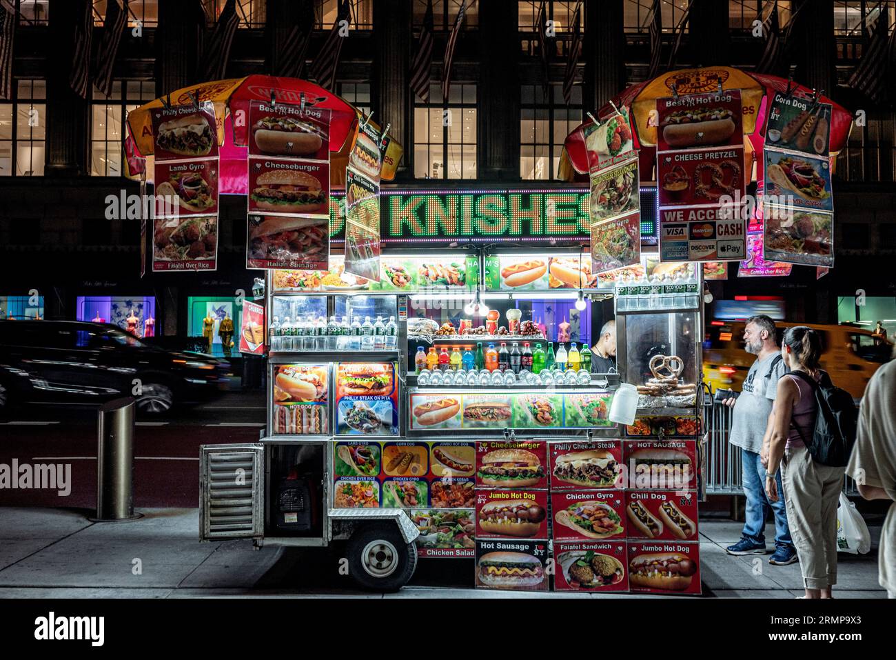 New York City is renowned for its vibrant street food scene, and food trucks play a significant role in offering diverse and delicious culinary option Stock Photo