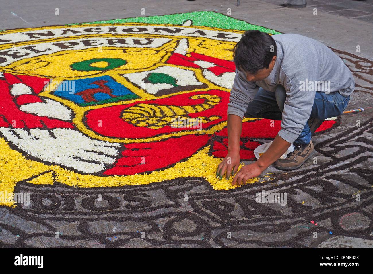Lima, Peru. 29th Aug, 2023. Craftsman preparing a carpet of flowers through which the procession of Devotees carrying the image of Santa Rosa de Lima on their shoulders at Lima downtown as every august 30th. Saint Rose of Lima, born Isabel Flores de Oliva, 20 April 1586 - 24 August 1617, is the patroness of the Americas and National Police of Peru. Credit: Fotoholica Press Agency/Alamy Live News Stock Photo