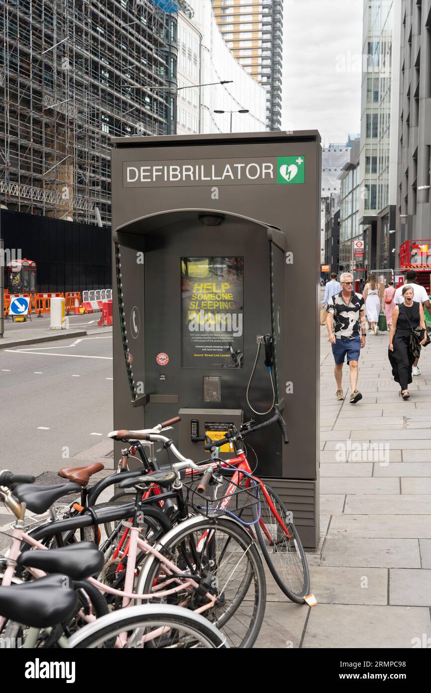 A defibrillator for emergency access in a former telephone box, part of the expanding national defibrillator network. The A10, London, England Stock Photo