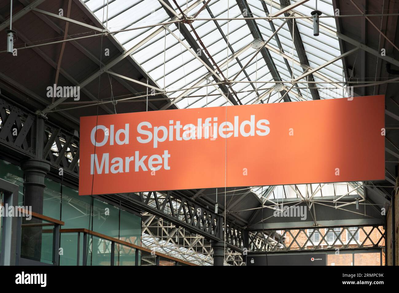 A hanging sign advertising Old Spitalfields Market in Old Spitalfields covered market hall. Spitalfields, London, UK Stock Photo