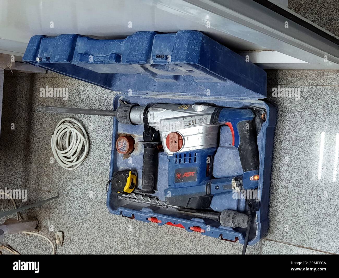Cairo, Egypt, August 24 2023: Hammer drill for concrete blocks, A drill is a tool used for making round holes or driving fasteners, Drills are commonl Stock Photo