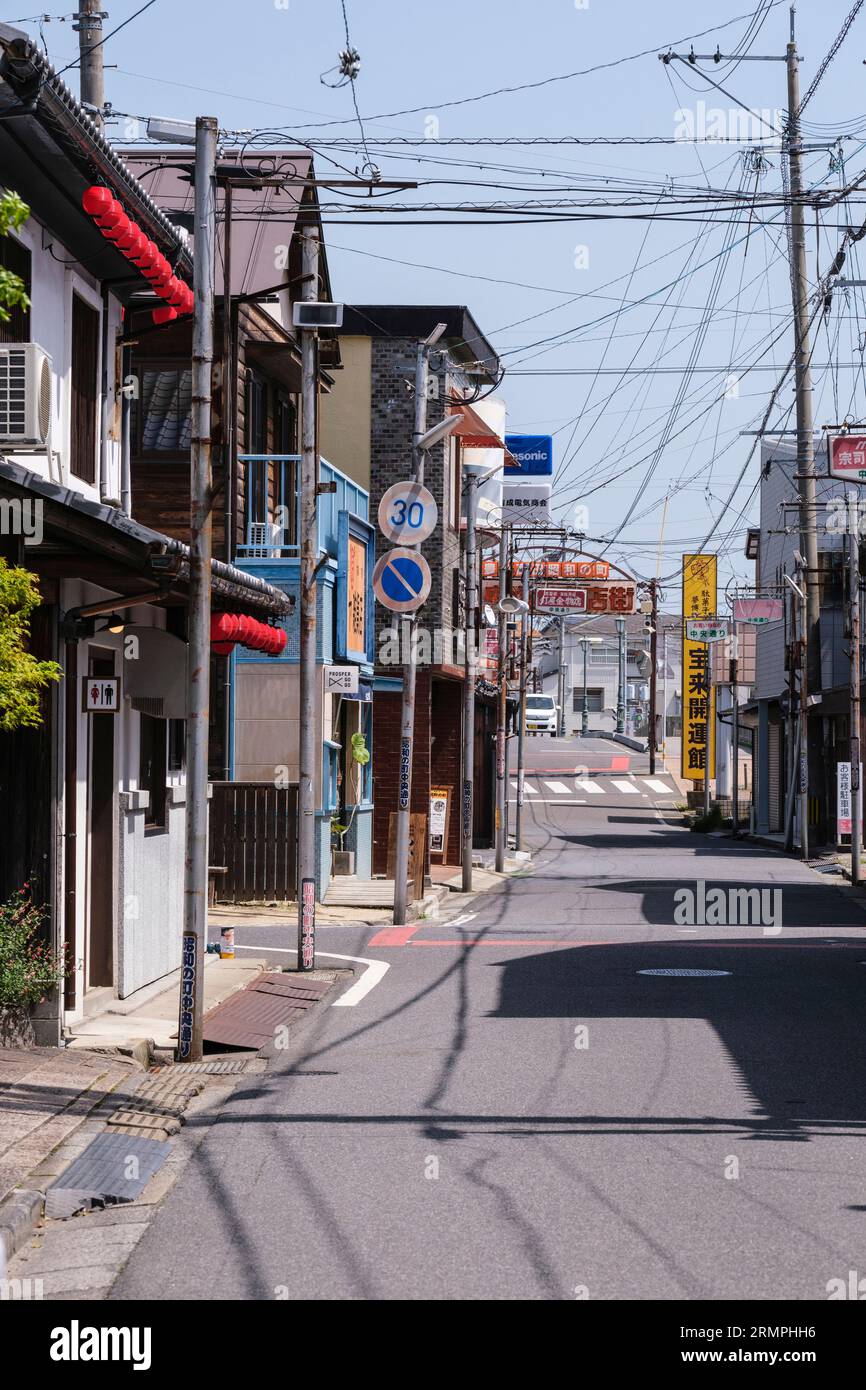 Japan, Kyushu. Bungotakada Street Scene with Architecture