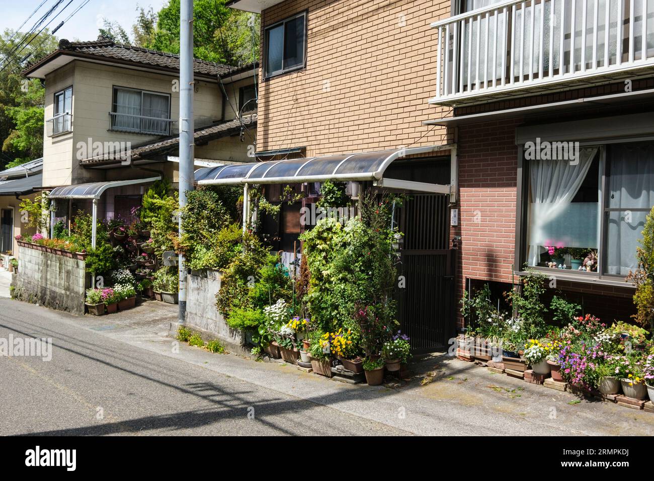 Japan, Kyushu. Taketa Houses with Floral Decorations. Oita Prefecture. Stock Photo