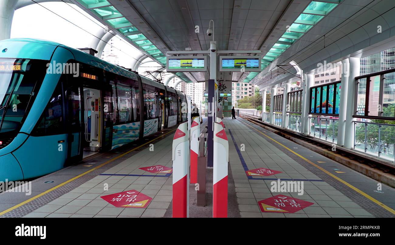 A car to Tamsui Fisherman's Wharf is waiting for depart from Hongshulin light rail Station. Stock Photo