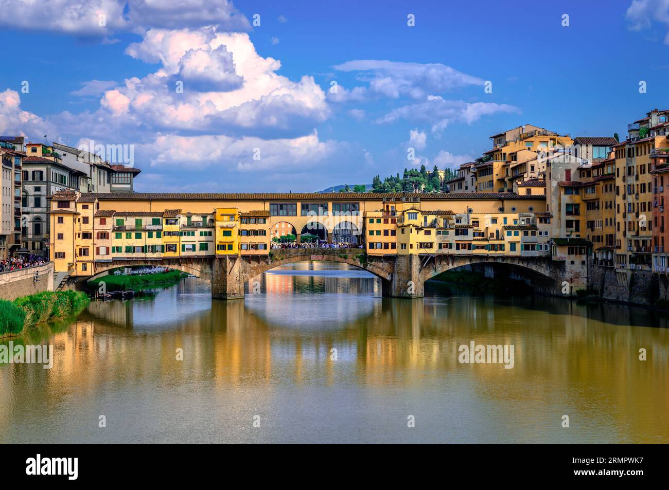 Ponte Vecchio (old Bridge) in Florence, Italy. This medieval stone bridge that spans river Arno, consists of three segmental arches and it has always Stock Photo