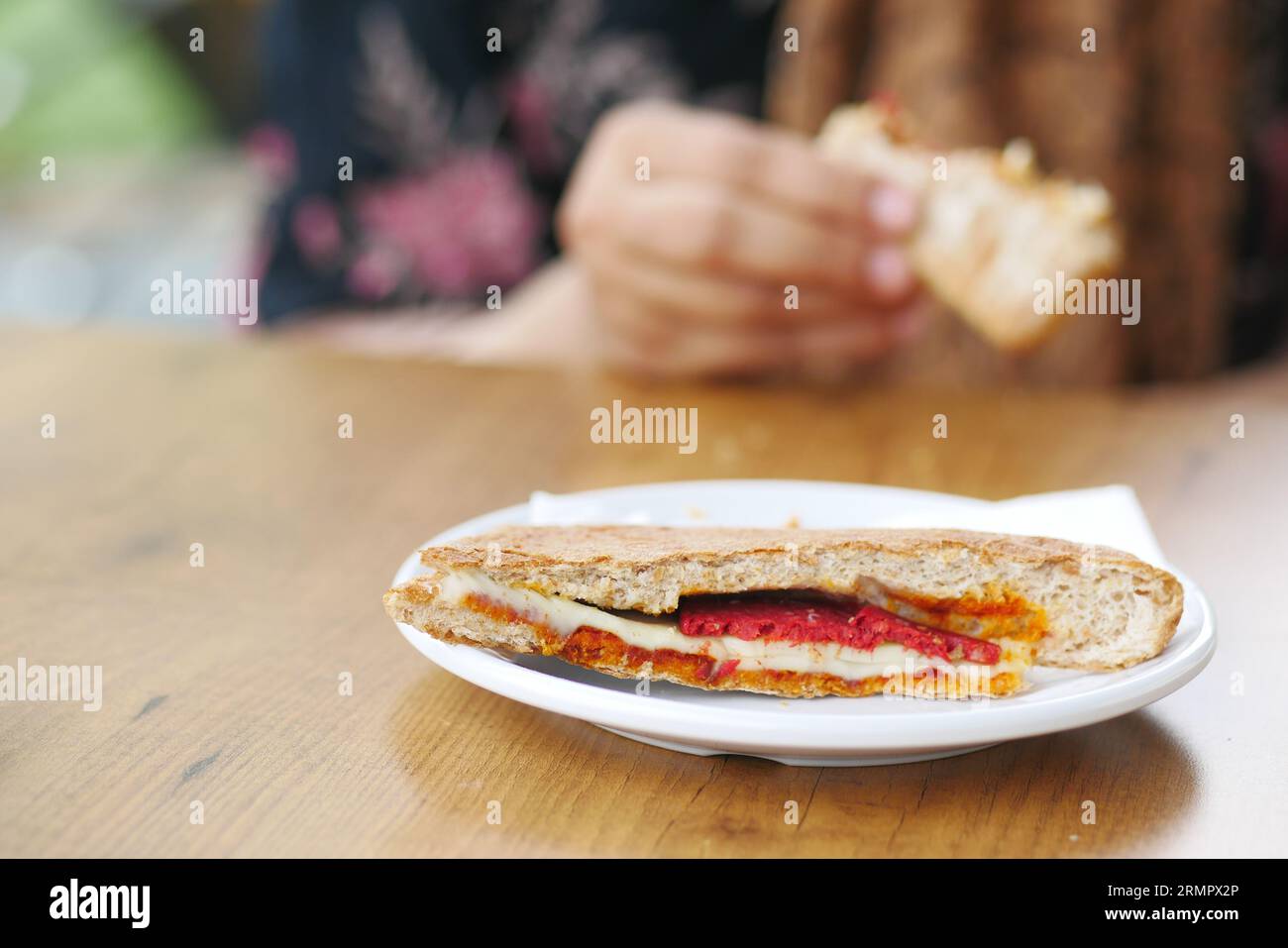 Women hand pick sandwich hi-res stock photography and images - Alamy