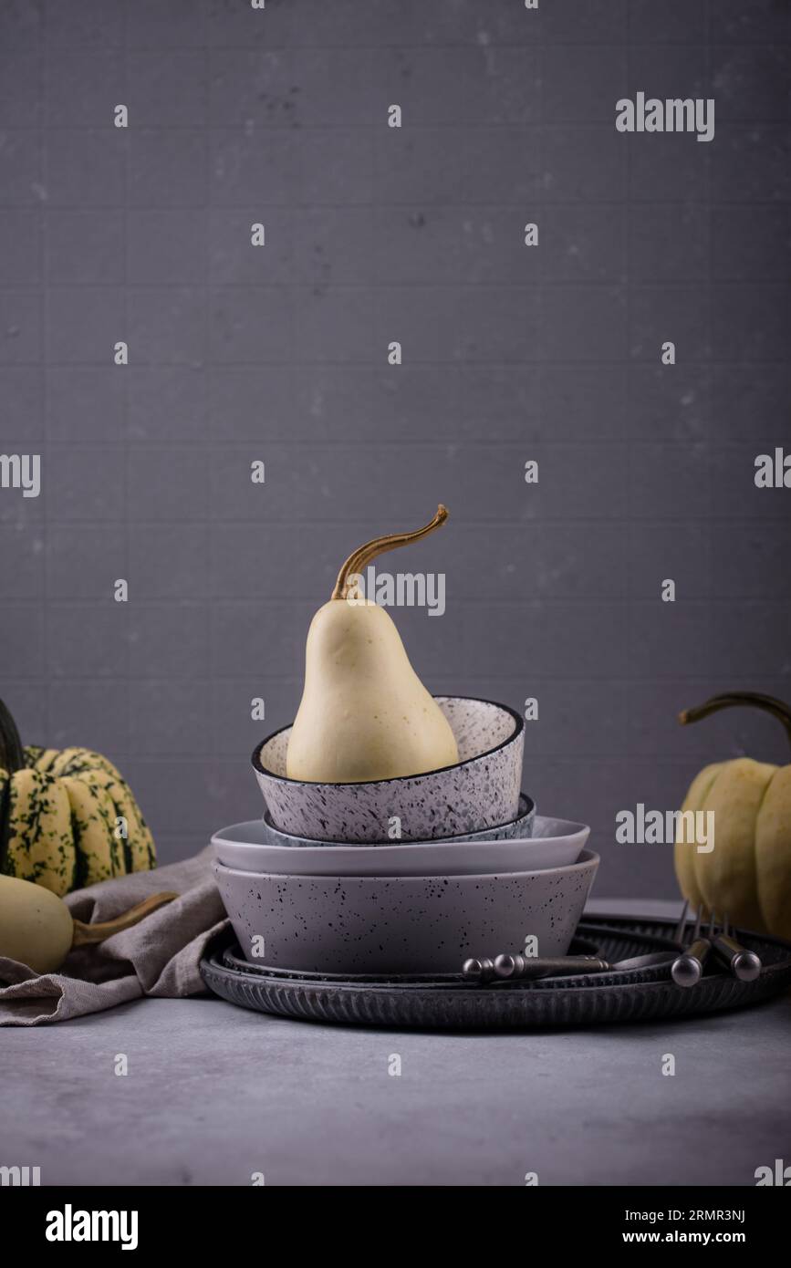Decorative pumpkin on grey background Stock Photo - Alamy