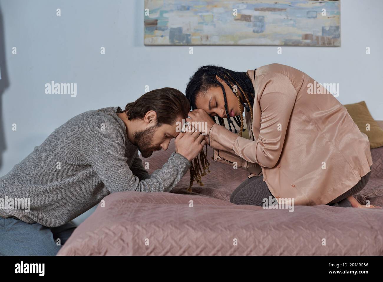 african american woman holding hands with man, worried multicultural couple bonding, empathy, trust Stock Photo