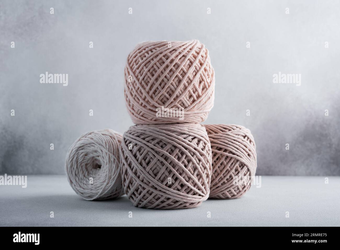 Stack of cotton threads pastel color skeins for craft and handmade on a ...