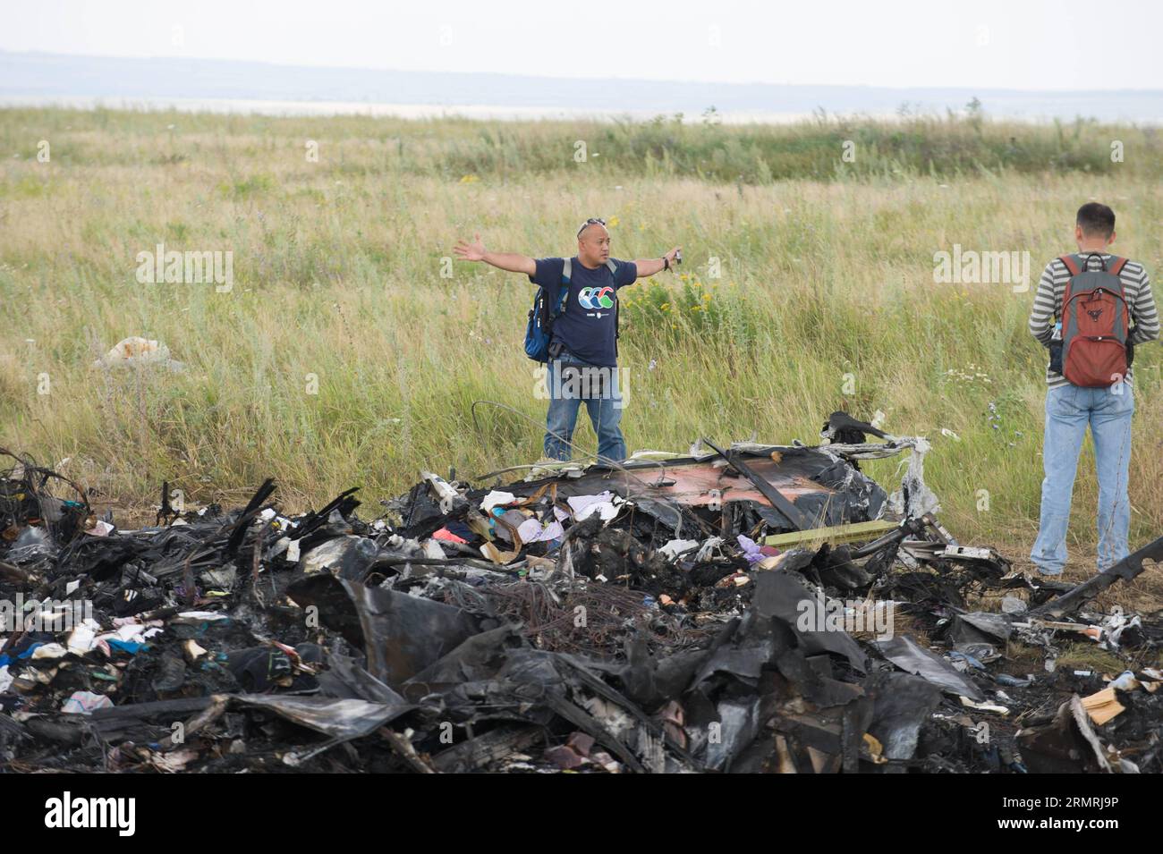 (140722) -- DONETSK, July 22, 2014 (Xinhua) -- Experts from Malaysian investgation team inspect the crash site of flight MH17 of Malaysia Airlines in Ukraine s Donetsk region, on July 22, 2014. The flight MH17 of Malaysia Airlines crashed on July 17 in Ukraine s Donetsk region, with all the 298 people on board having been killed. (Xinhua/Dai Tianfang)(zhf) UKRAINE-DONETSK-MH17-MALAYSIAN EXPERT-INVESTIGATION PUBLICATIONxNOTxINxCHN   Donetsk July 22 2014 XINHUA Experts from Malaysian investgation Team inspect The Crash Site of Flight  of Malaysia Airlines in Ukraine S Donetsk Region ON July 22 2 Stock Photo