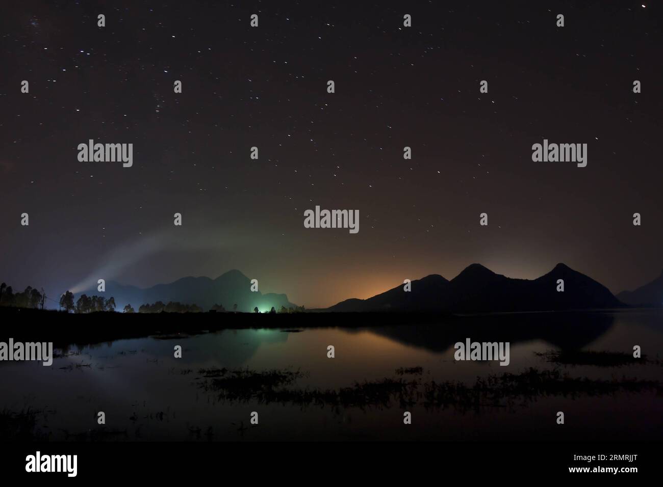 (140723) -- LIUZHOU, July 23, 2014 (Xinhua) -- Stars are seen in the sky above Liucheng County in Liuzhou City, south China s Guangxi Zhuang Autonomous Region, July 21, 2014. (Xinhua/Deng Keyi) (ry) CHINA-GUANGXI-LIUZHOU-NIGHT SCENERY (CN) PUBLICATIONxNOTxINxCHN   Liuzhou July 23 2014 XINHUA Stars are Lakes in The Sky above Liucheng County in Liuzhou City South China S Guangxi Zhuang Autonomous Region July 21 2014 XINHUA Deng Keyi Ry China Guangxi Liuzhou Night scenery CN PUBLICATIONxNOTxINxCHN Stock Photo