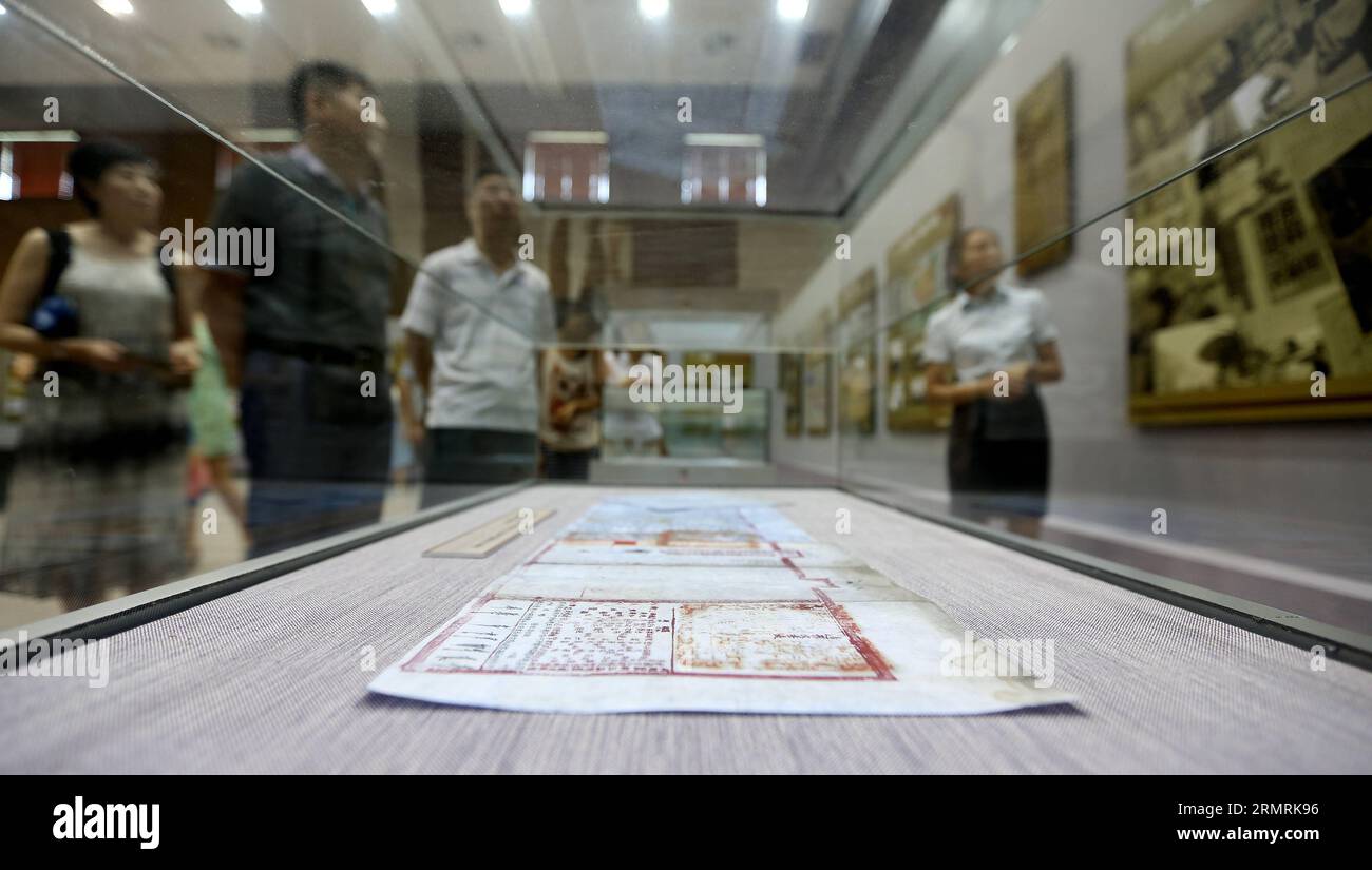 (140724) -- SHENYANG, July 24, 2014 (Xinhua) -- People visit the file and photo exhibition marking the 120th anniversary of the First Sino-Japanese War, in Shengyang, capital of northeast China s Liaoning Province, July 24, 2014. The exhibition displayed more than 200 files and photos about the war in 1894. (Xinhua/Yao Jianfeng) (hpj) CHINA-SHENYANG-FIRST SINO-JAPANESE WAR-FILE, PHOTO EXHIBITION (CN) PUBLICATIONxNOTxINxCHN   Shenyang July 24 2014 XINHUA Celebrities Visit The File and Photo Exhibition marking The  Anniversary of The First SINO Japanese was in Sheng Yang Capital of Northeast Chi Stock Photo