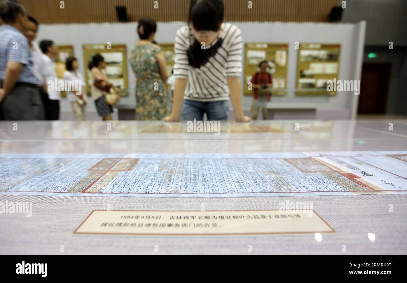 (140724) -- SHENYANG, July 24, 2014 (Xinhua) -- People visit the file and photo exhibition marking the 120th anniversary of the First Sino-Japanese War, in Shengyang, capital of northeast China s Liaoning Province, July 24, 2014. The exhibition displayed more than 200 files and photos about the war in 1894. (Xinhua/Yao Jianfeng) (hpj) CHINA-SHENYANG-FIRST SINO-JAPANESE WAR-FILE, PHOTO EXHIBITION (CN) PUBLICATIONxNOTxINxCHN   Shenyang July 24 2014 XINHUA Celebrities Visit The File and Photo Exhibition marking The  Anniversary of The First SINO Japanese was in Sheng Yang Capital of Northeast Chi Stock Photo