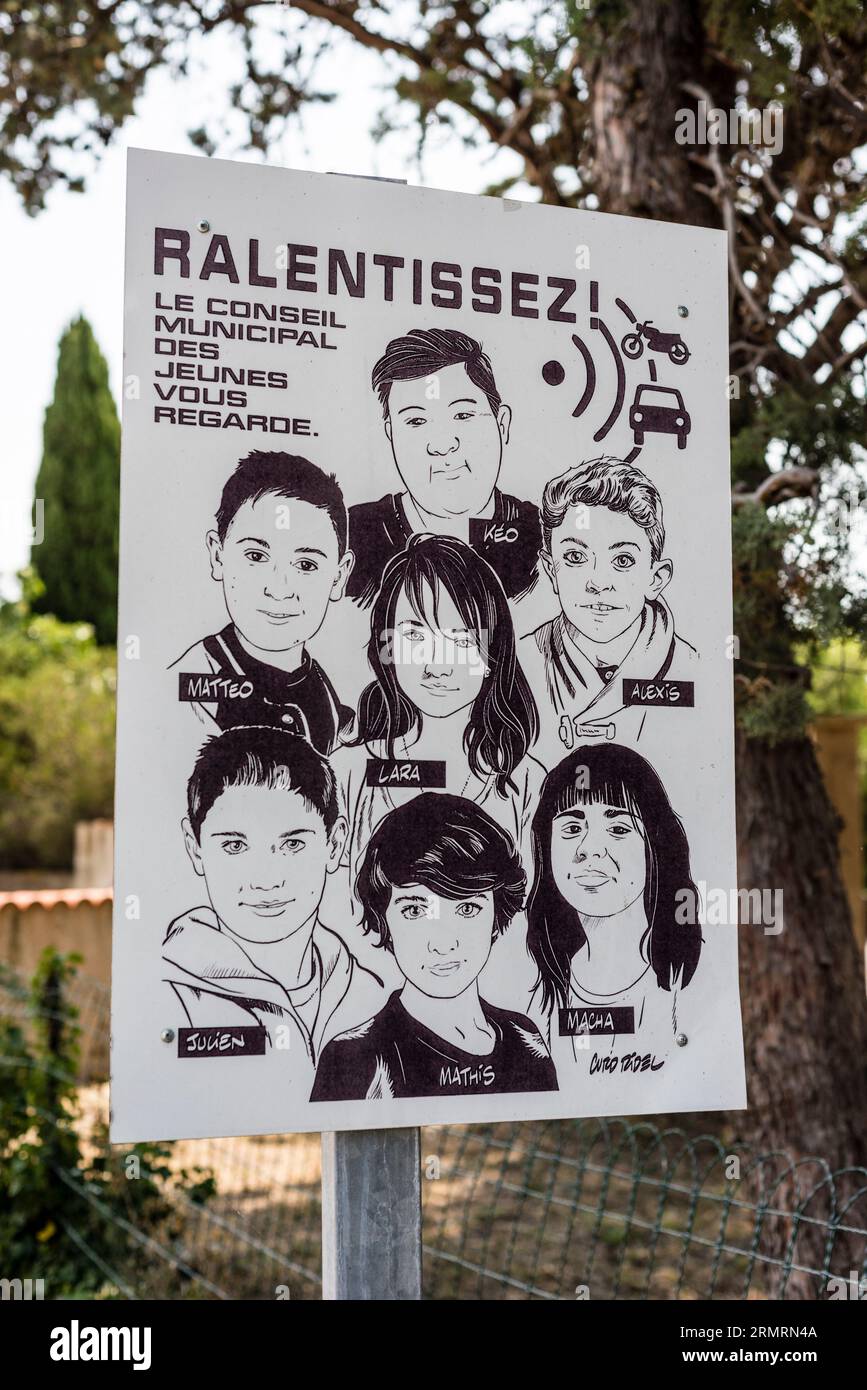 Poster asking drivers to slow down, Bouzigues, Herault, Occitanie, France Stock Photo