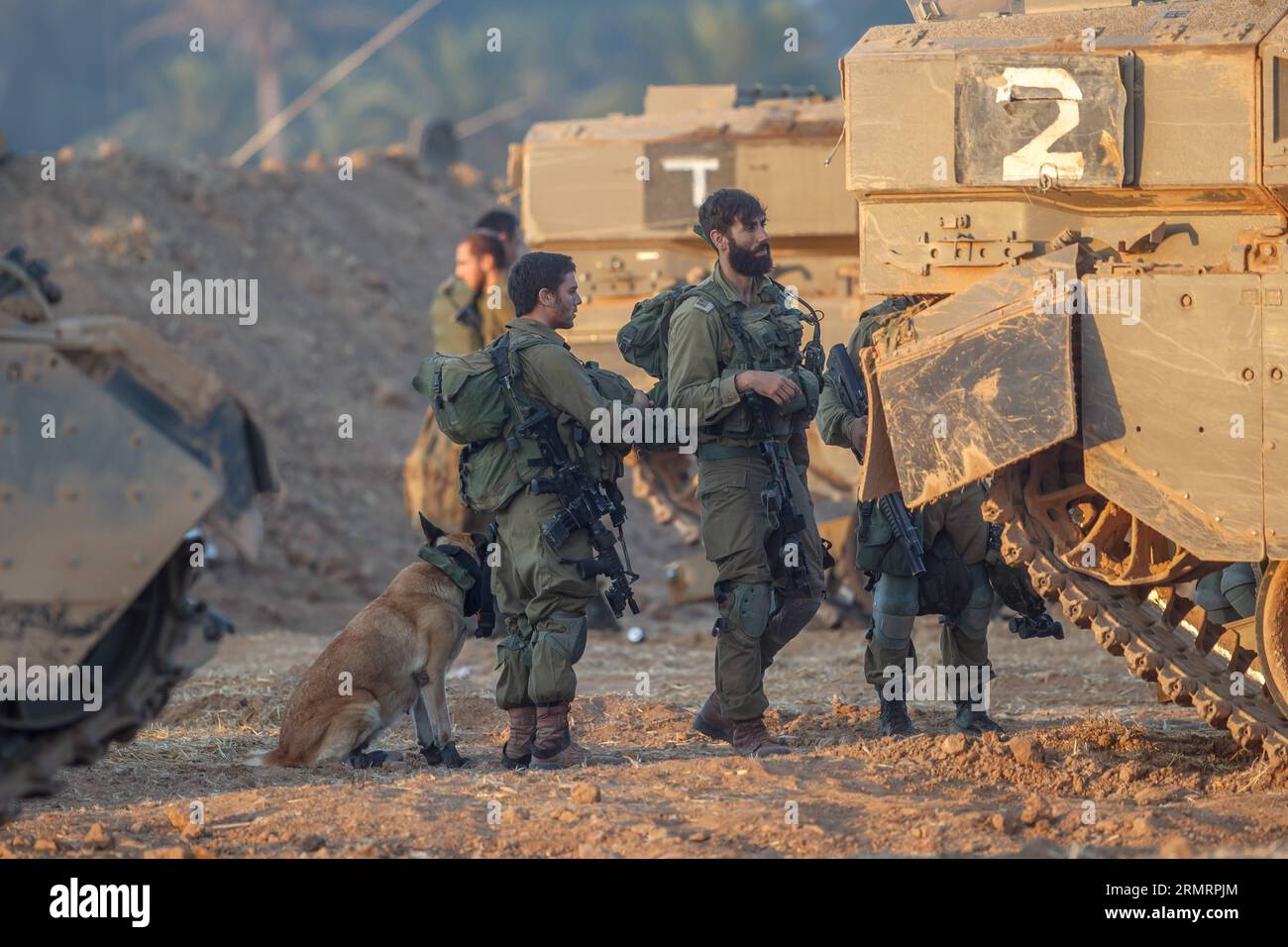 GAZA BORDER, July 30, 2014 -- Israeli soldiers from the Golani Brigade are seen at a staging area before entering Gaza from Israel, on July 30, 2014. Israeli Prime Minister Benjamin Netanyahu said on Thursday that Israel will continue to uproot underground tunnels in Gaza regardless of any possible cease-fire agreement. ) GAZA-ISRAEL-SOLDIERS JINI PUBLICATIONxNOTxINxCHN   Gaza Border July 30 2014 Israeli Soldiers from The Golani Brigade are Lakes AT a Staging Area Before ENTERING Gaza from Israel ON July 30 2014 Israeli Prime Ministers Benjamin Netanyahu Said ON Thursday Thatcher Israel will c Stock Photo