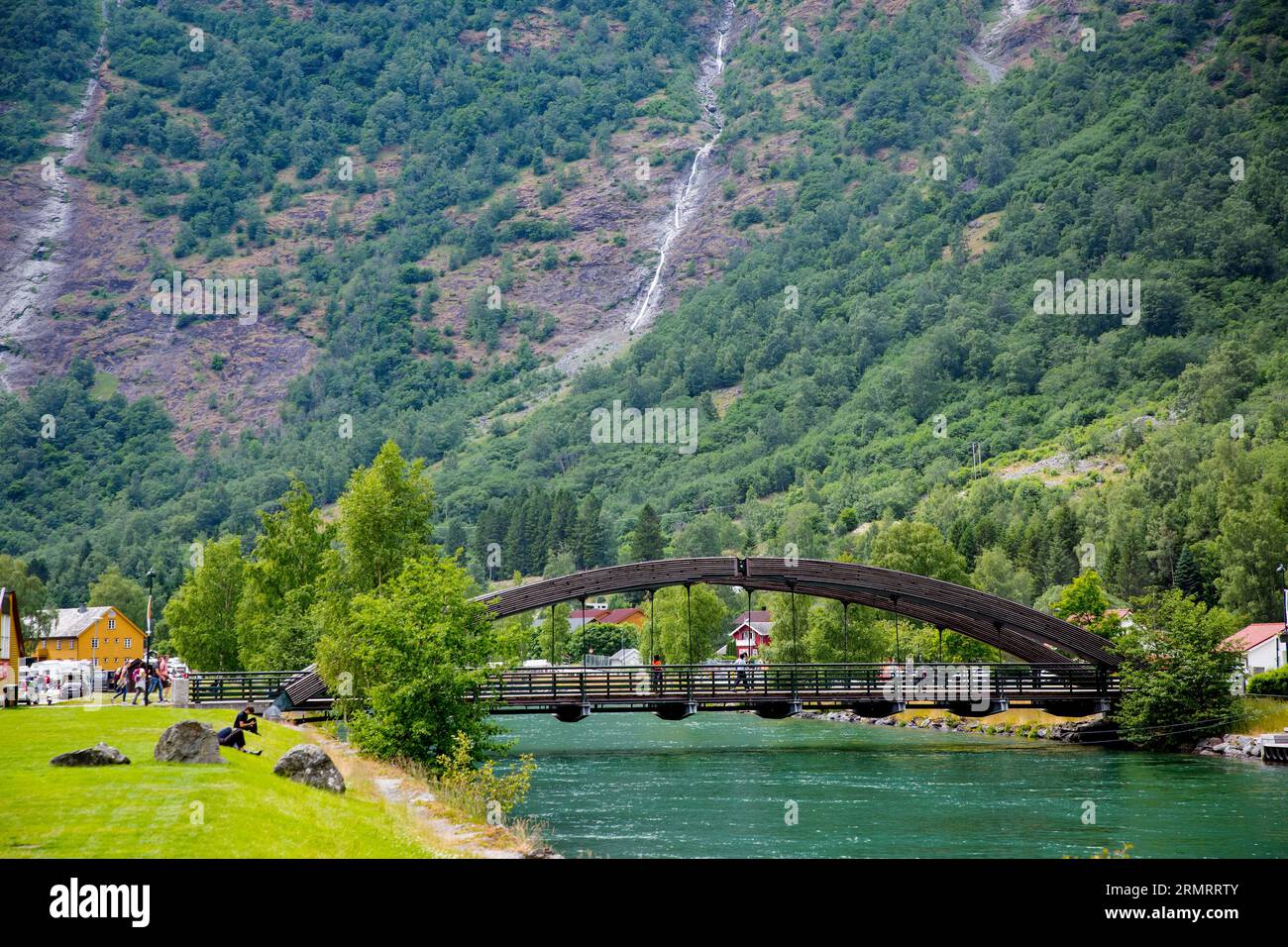 Aurland, Norway - Jun 20, 2023: Bridge over the river Flamselvi in picturesque town of Flam in the Flomsdalen valley and Aurlandsfjord, Norway. Stock Photo