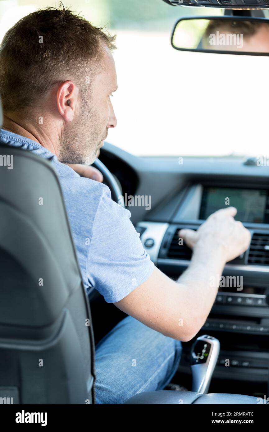 Woman using navigator system hi-res stock photography and images - Alamy