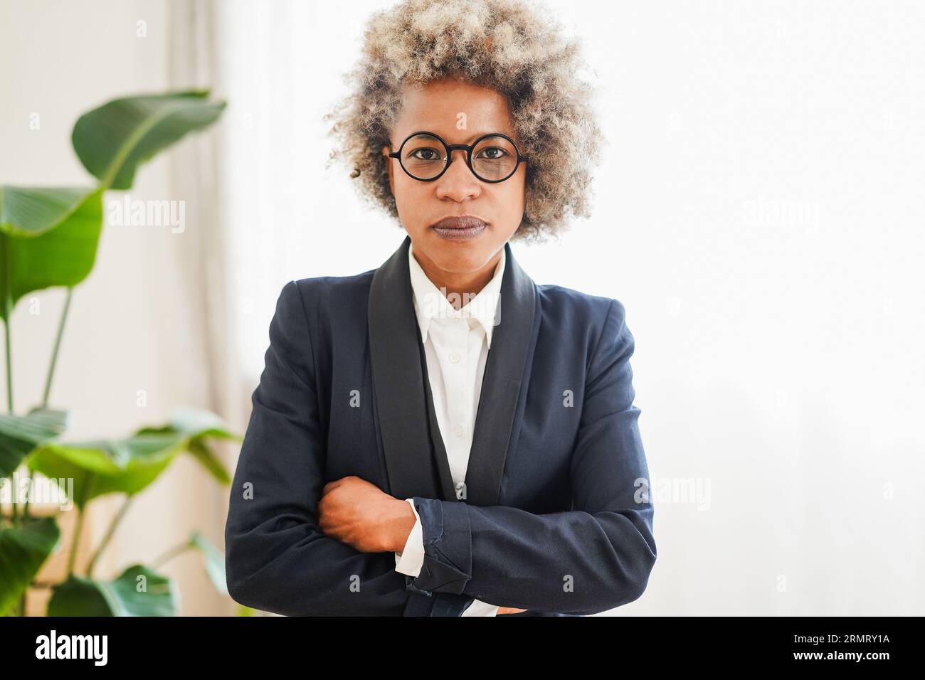 African business woman inside work office - Entrepreneur and confident ...