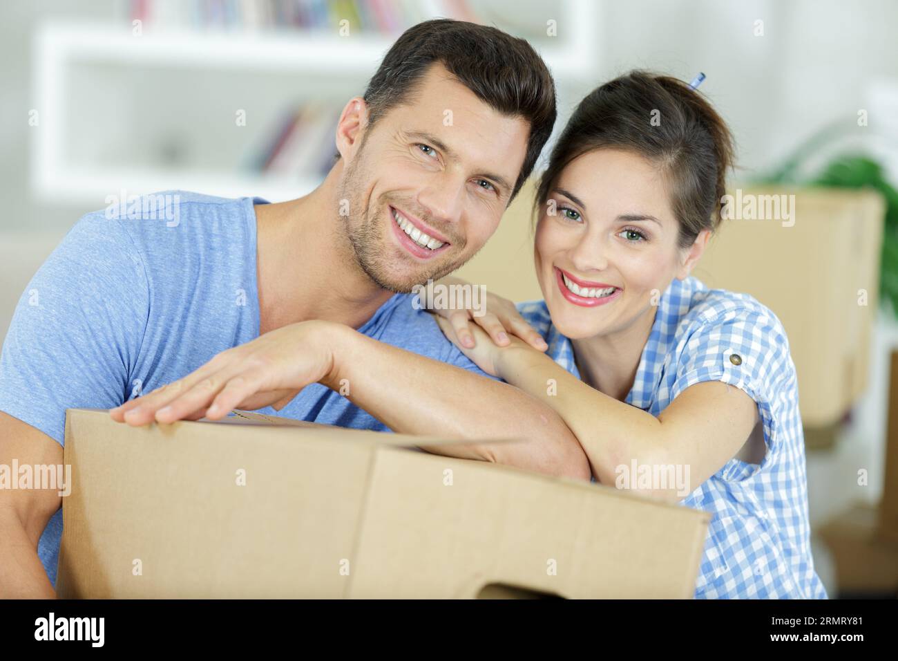 happy couple showing keys of new home Stock Photo - Alamy