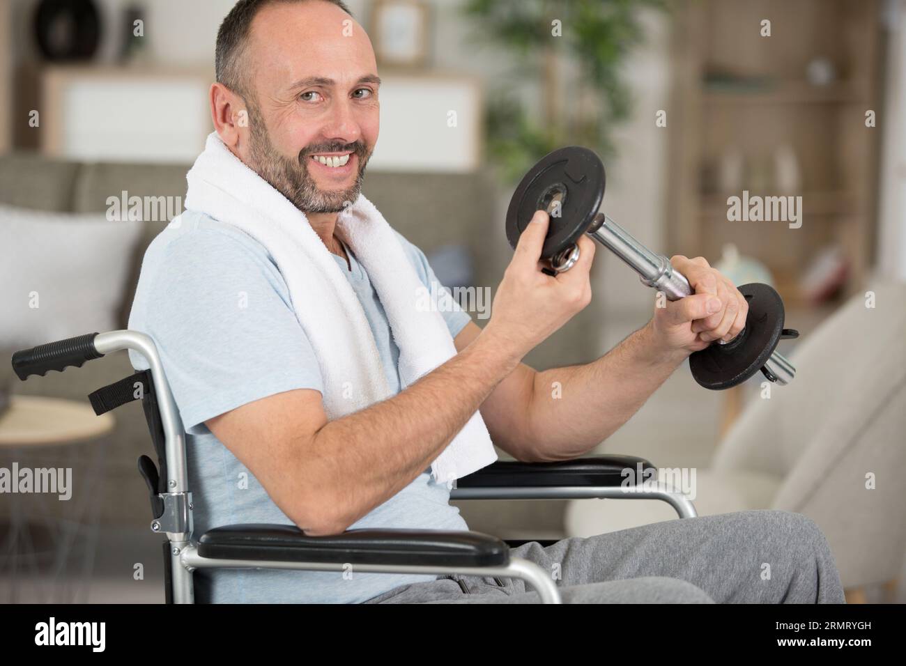 Man in power wheelchair hi-res stock photography and images - Alamy