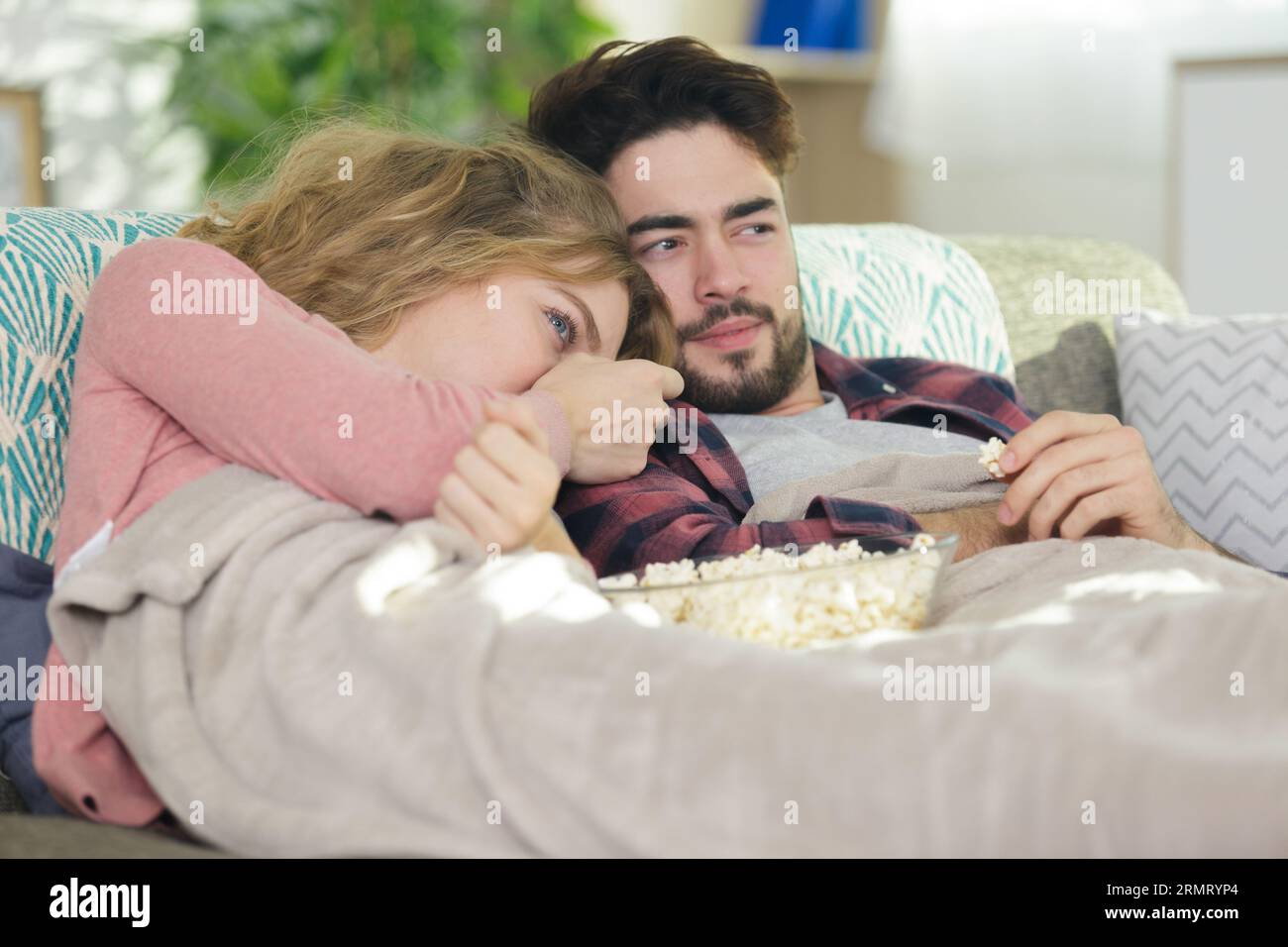 Photo For Incompatibility couple incompatibility problems watching tv Stock Photo - Alamy