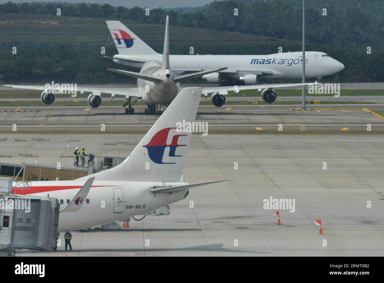 (140808) -- KUALA LUMPUR, Aug. 8, 2014 -- Malaysia Airlines flights are seen parking at the Kuala Lumpur International Airport in Kuala Lumpur, Malaysia, Aug. 8, 2014. Khazanah Nasional Bhd, Malaysia Airlines (MAS) largest shareholder, said on Friday that it sought to delist the national carrier to facilitate its plan to undertake a comprehensive review and restructuring of MAS. ) MALAYSIA-MAS-KHAZANAH NASIONAL BHD-DELIST ChongxVoonxChung PUBLICATIONxNOTxINxCHN   Kuala Lumpur Aug 8 2014 Malaysia Airlines Flights are Lakes Parking AT The Kuala Lumpur International Airport in Kuala Lumpur Malays Stock Photo
