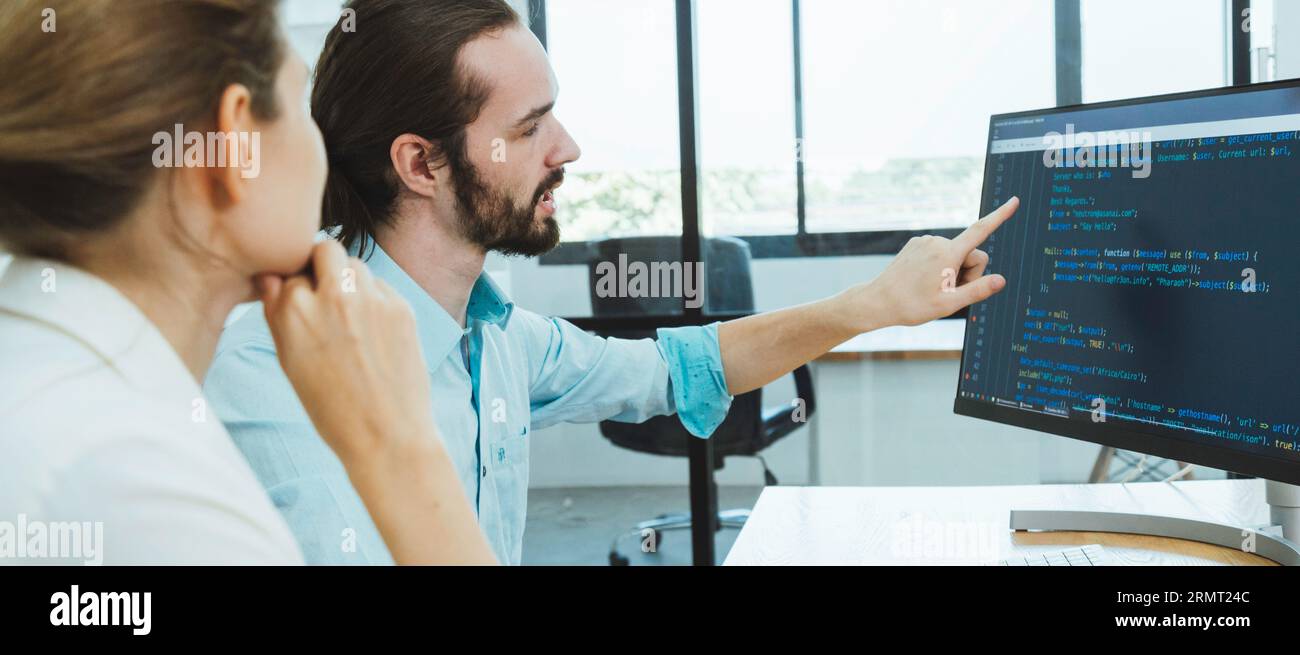 Professional development programers programming game software or developing code for shopping online financial data security system network working at Stock Photo