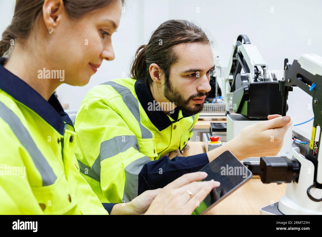 automation machine engineer students study and inspection control robot training kit machine in robotics academy at university or factory workshop. AI Stock Photo