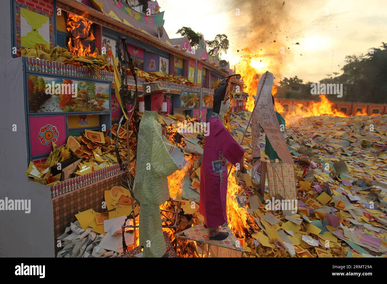 (140810) -- MEDAN, Aug. 10, 2014 -- Incense paper is burnt to honor people s ancestors during the Hungry Ghost Festival in Medan, North Sumatra, Indonesia, Aug. 10, 2014. The Hungry Ghost Festival is celebrated on the 15th day of the seventh lunar month. ) INDONESIA-MEDAN-HUNGRY GHOST FESTIVAL TantoxH. PUBLICATIONxNOTxINxCHN   Medan Aug 10 2014 incense Paper IS Burnt to HONOR Celebrities S ancestors during The Hungry Ghost Festival in Medan North Sumatra Indonesia Aug 10 2014 The Hungry Ghost Festival IS celebrated ON The 15th Day of The Seventh Lunar Month Indonesia Medan Hungry Ghost Festiva Stock Photo