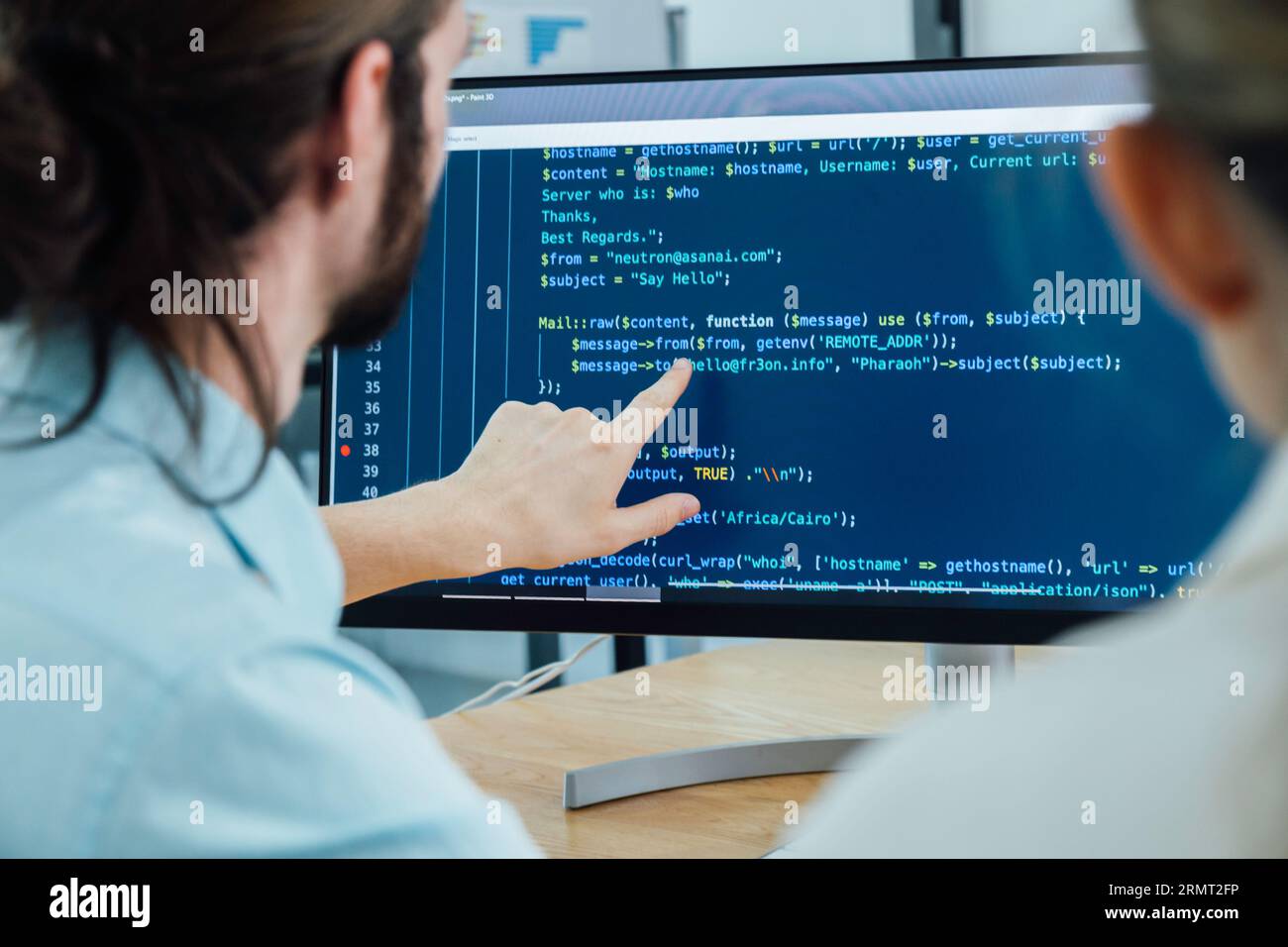Professional development programers programming game software or developing code for shopping online financial data security system network working at Stock Photo