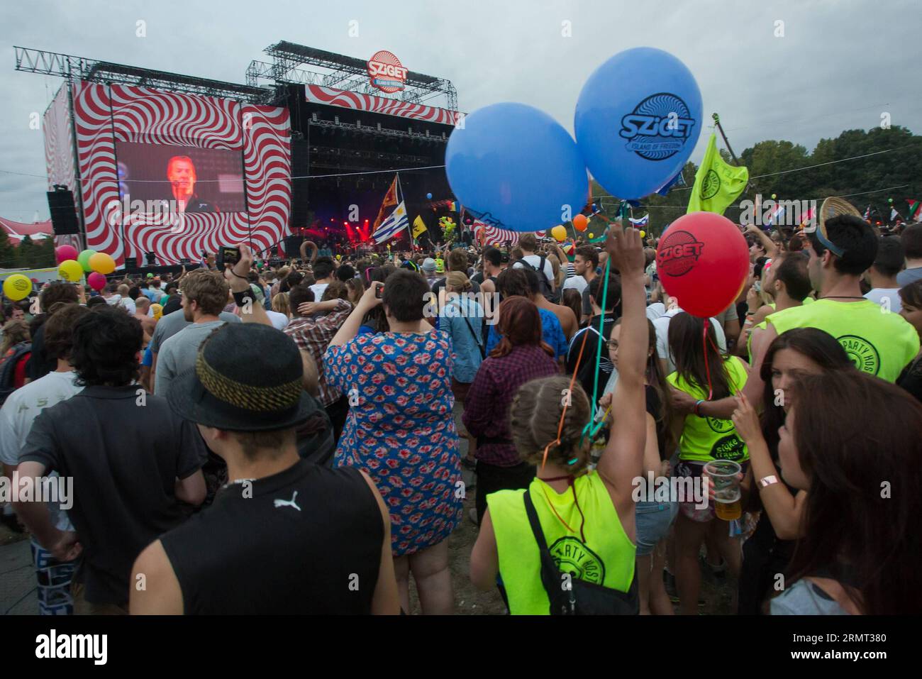 BUDAPEST, Aug. 12, 2014 -- People enjoy a concert at the Sziget (Hungarian for Island ) festival on the Obuda Island in Budapest, Hungary, on Aug. 12, 2014. The 22nd Sziget festival is held from Aug. 11 to Aug. 17. It is one of the largest music festivals in Europe, attracting nearly 400,000 people every year.) HUNGARY-BUDAPEST-SZIGET FESTIVAL AttilaxVolgyi PUBLICATIONxNOTxINxCHN   Budapest Aug 12 2014 Celebrities Enjoy a Concert AT The Sziget Hungarian for Iceland Festival ON The Obuda Iceland in Budapest Hungary ON Aug 12 2014 The 22nd Sziget Festival IS Hero from Aug 11 to Aug 17 IT IS One Stock Photo