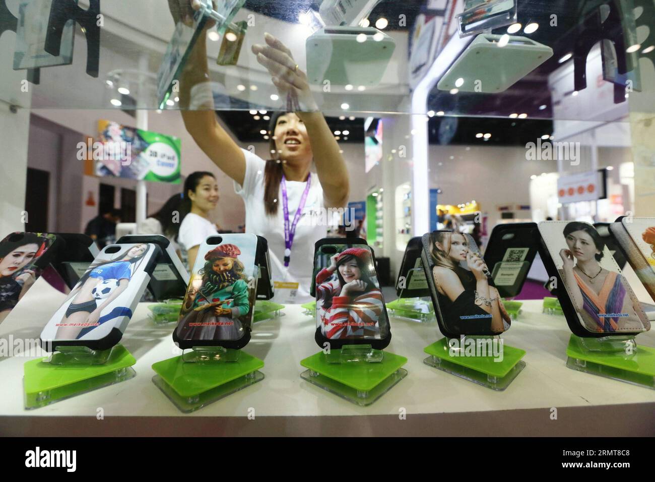 BEIJING, Aug. 21, 2014 () -- A series of iPhone cases are displayed during the Macworld/iWorld Asia 2014, an Apple peripherals and accessories event, in Beijing, capital of China, Aug. 21, 2014. The four-day event kicked off Thursday at Beijing s China National Convention Center, attracting over 300 world exhibitors. () (lmm) CHINA-BEIJING-TECHNOLOGY-MACWORLD/IWORLD ASIA-EXHIBITION (CN) Xinhua PUBLICATIONxNOTxINxCHN   Beijing Aug 21 2014 a Series of iPhone Cases are displayed during The MacWorld iWorld Asia 2014 to Apple  and Accessories Event in Beijing Capital of China Aug 21 2014 The Four D Stock Photo
