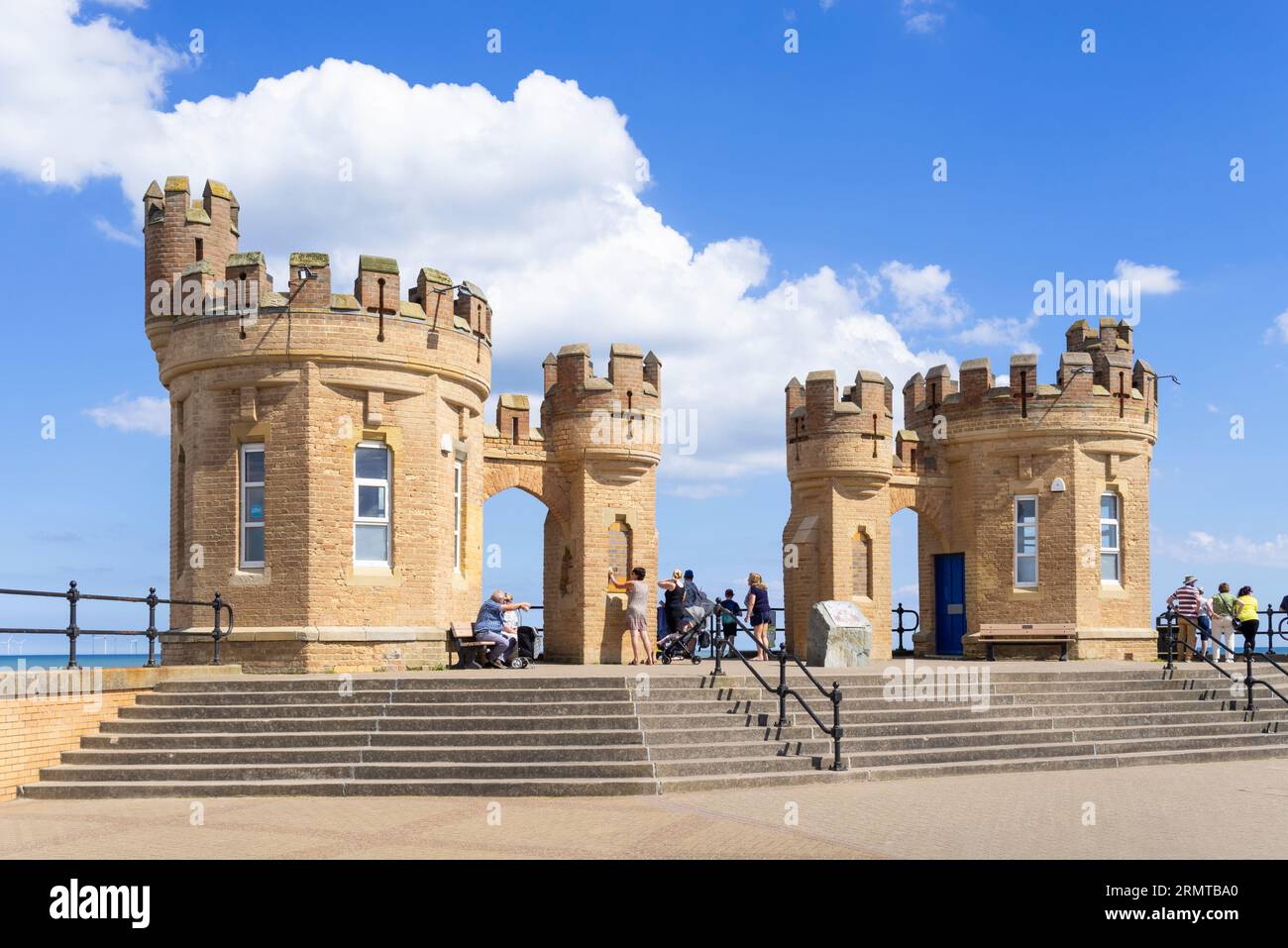 Withernsea Pier towers and Withernsea Promenade and remains of the Pier towers in Withernsea East Riding of Yorkshire England UK GB Europe Stock Photo