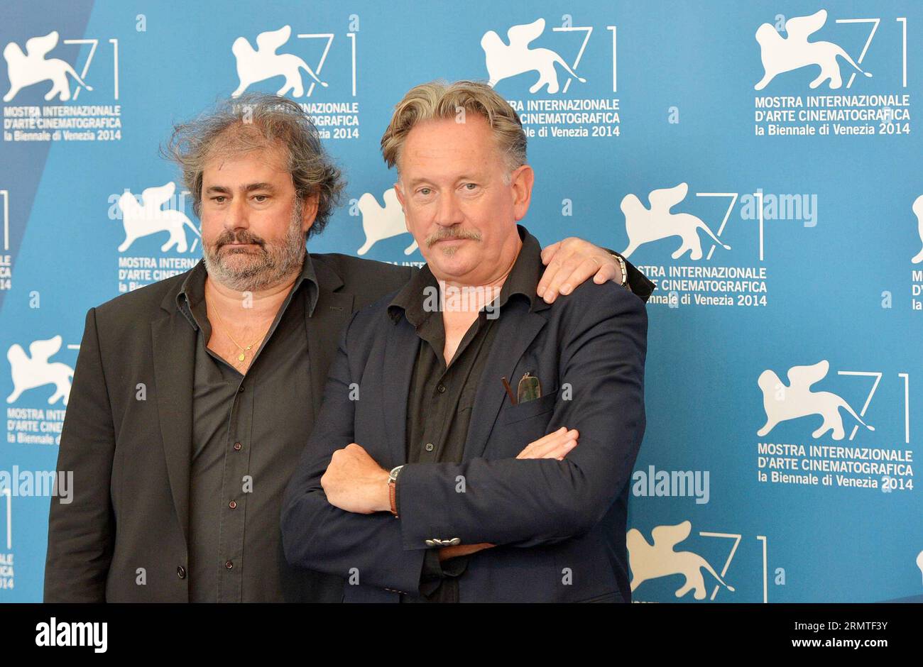 (140901) -- VENICE, Sept. 1, 2014 -- Directors Gustave Kervern (L) and Benoit Del¨¦pine pose during the photo call for Near Death Experience which is selected for the horizons competition during the 71st Venice Film Festival, in Lido of Venice, Italy on Sept. 1, 2014. ) ITALY-VENICE-FILM FESTIVAL-NEAR DEATH EXPERIENCE-PHOTO CALL LiuxLihang PUBLICATIONxNOTxINxCHN   Venice Sept 1 2014 Directors Gustave Kervern l and Benoit  Pose during The Photo Call for Near Death Experience Which IS Selected for The HORIZONS Competition during The 71st Venice Film Festival in Lido of Venice Italy ON Sept 1 201 Stock Photo