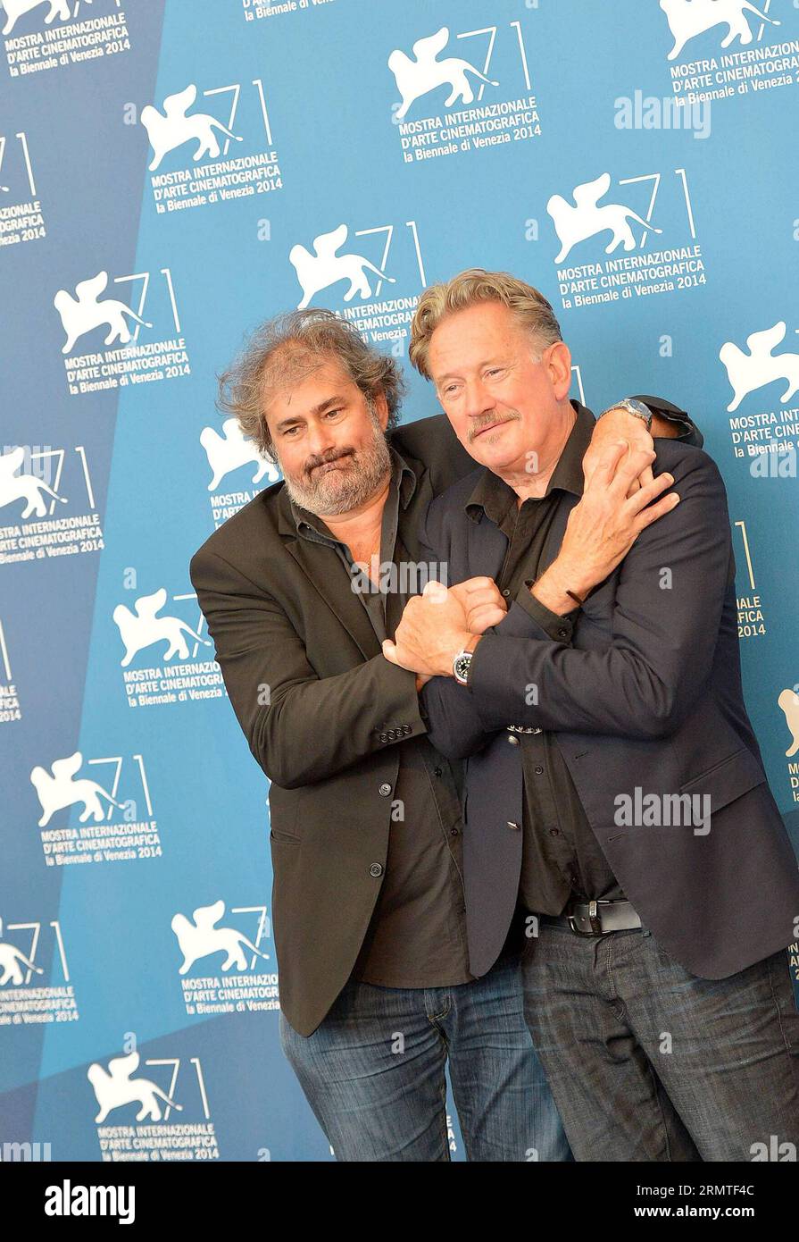 (140901) -- VENICE, Sept. 1, 2014 -- Directors Gustave Kervern (L) and Benoit Del¨¦pine pose during the photo call for Near Death Experience which is selected for the horizons competition during the 71st Venice Film Festival, in Lido of Venice, Italy on Sept. 1, 2014. ) ITALY-VENICE-FILM FESTIVAL-NEAR DEATH EXPERIENCE-PHOTO CALL LiuxLihang PUBLICATIONxNOTxINxCHN   Venice Sept 1 2014 Directors Gustave Kervern l and Benoit  Pose during The Photo Call for Near Death Experience Which IS Selected for The HORIZONS Competition during The 71st Venice Film Festival in Lido of Venice Italy ON Sept 1 201 Stock Photo