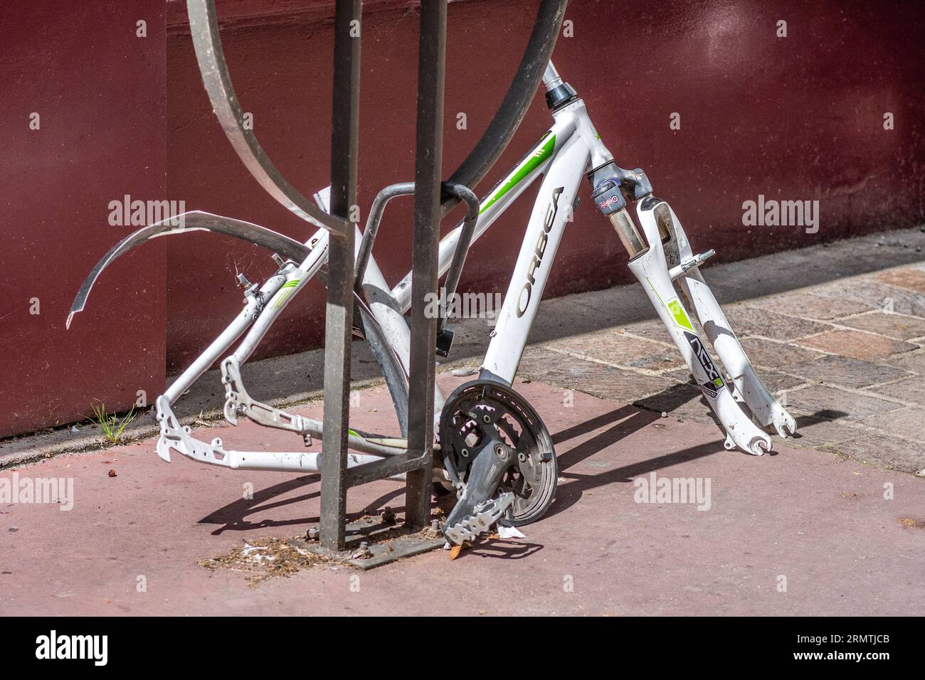 Abandoned 'Orbea' sport bicycle frame stripped of all parts - Tours, Indre-et-Loire (37), France. Stock Photo