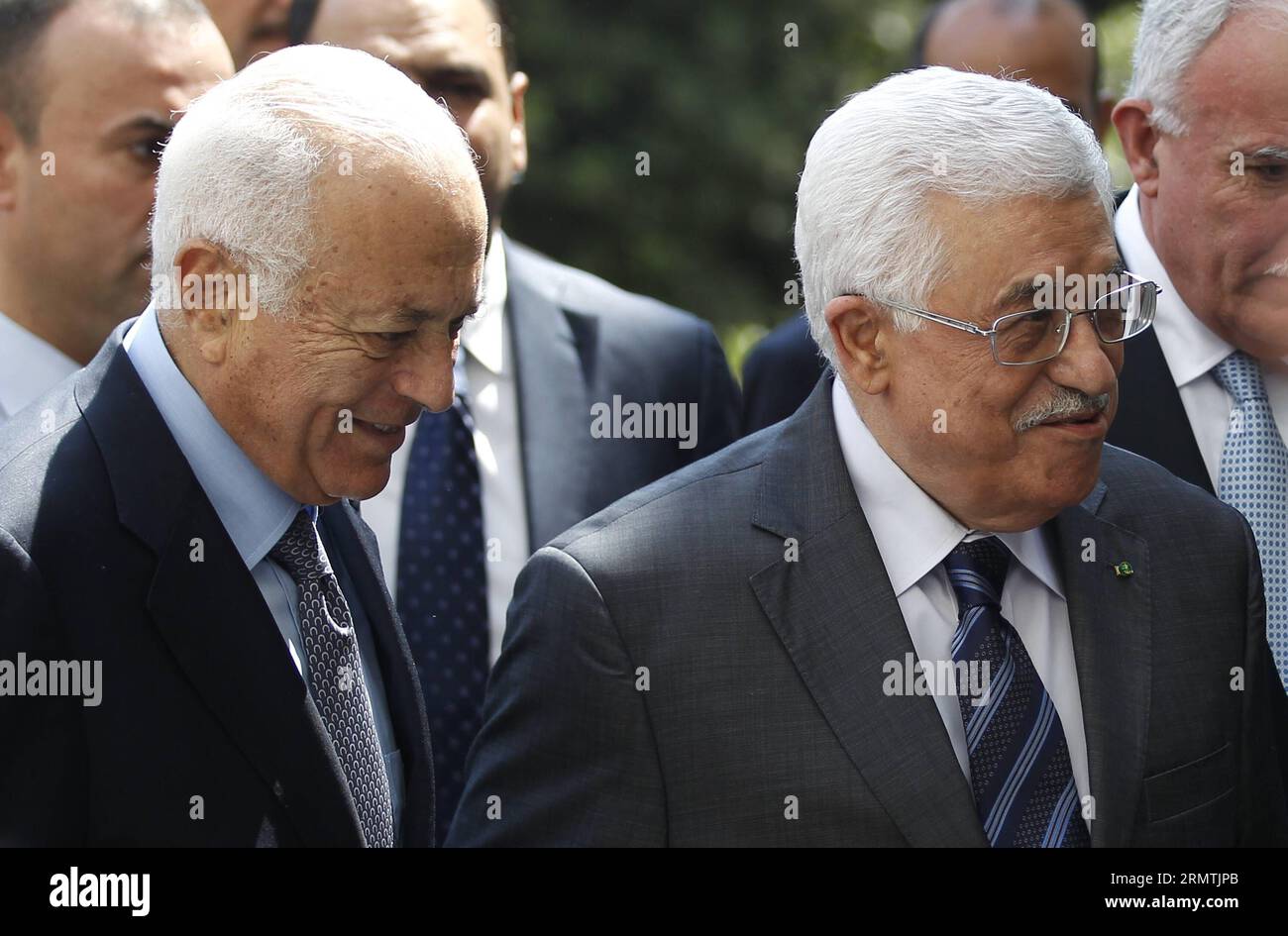 (140907) -- CAIRO, Sept. 7, 2014 -- Arab League Secretary General Nabil al-Arabi (L) and Palestinian President Mahmoud Abbas (R) walk into an an Arab League emergency meeting in Cairo, Egypt, Sept. 7, 2014. Arab foreign ministers were expected to issue a resolution to confront militants overrunning large areas of Iraq and Syria and declared a cross-border Islamic States. ) EGYPT-ARAB LEAGUE-EMERGENCY MEETING AhmedxGomaa PUBLICATIONxNOTxINxCHN   Cairo Sept 7 2014 Arab League Secretary General Nabil Al Arabi l and PALESTINIAN President Mahmoud Abbas r Walk into to to Arab League EMERGENCY Meetin Stock Photo